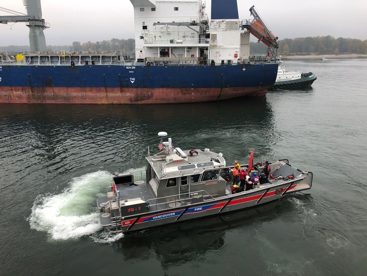 Vancouver Fire rescue swimmers deployed from Fire Boat 1 pulled an unresponsive woman from dangerous Columbia River currents.