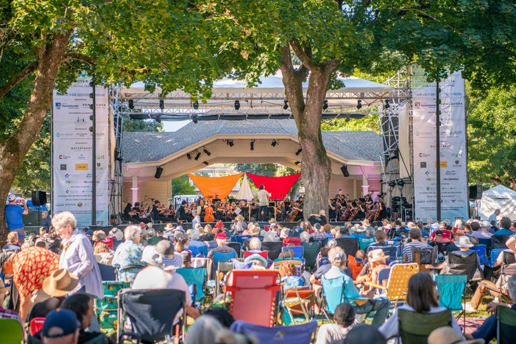 Attendees enjoy a performance at the 2025 Vancouver Arts and Music Festival.